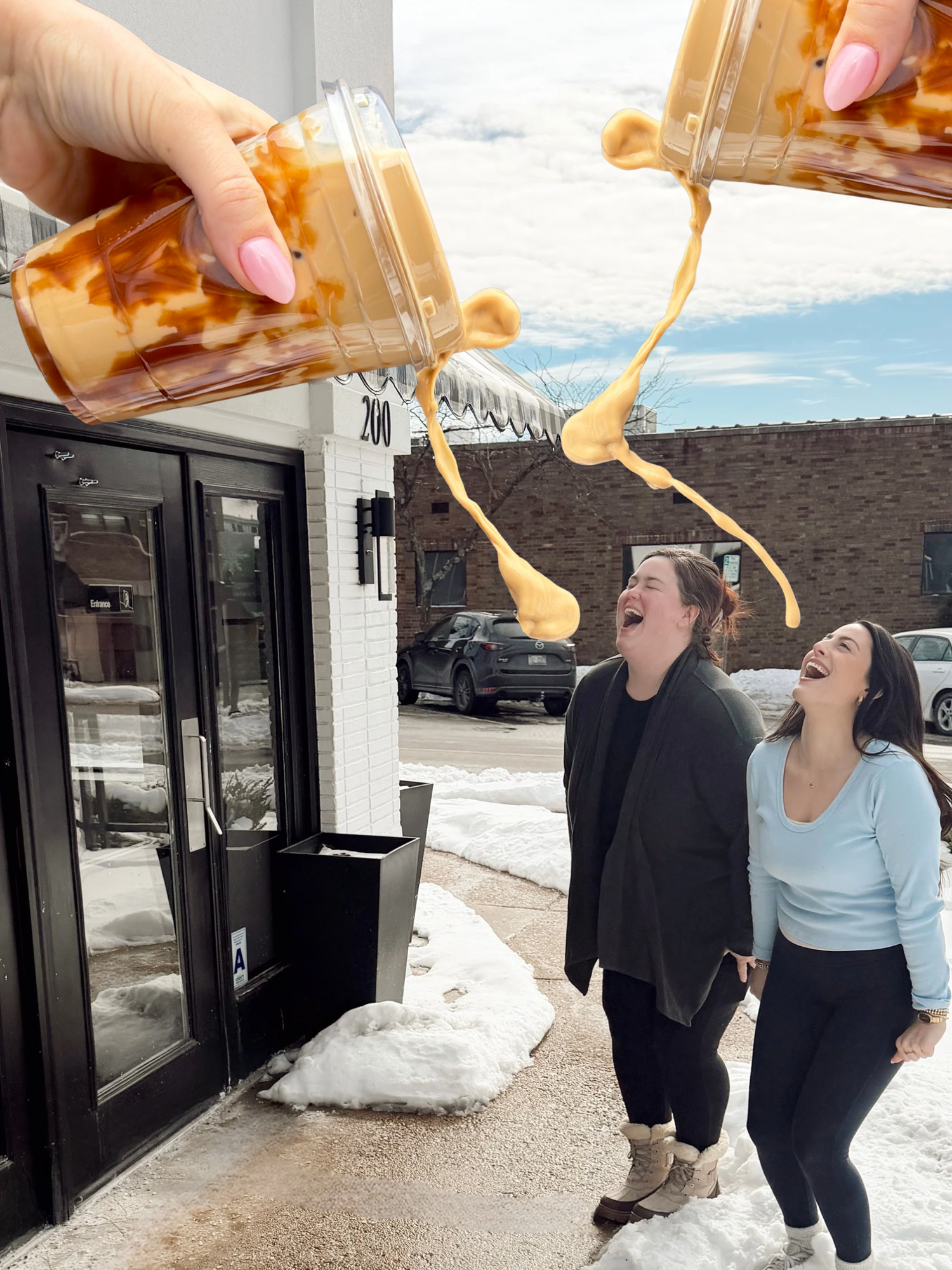 Two people laughing outdoors with a coffee pour in the background